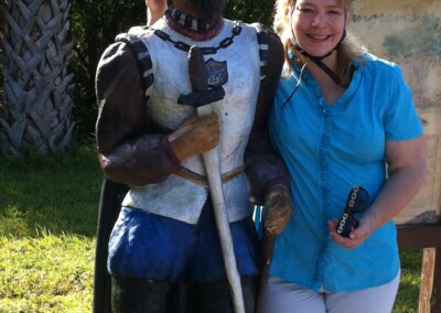 Virginia posing with statue at Ponce De Leon park