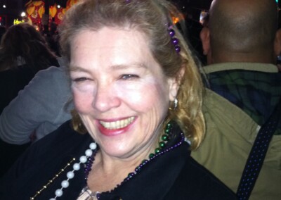 Virginia smiling at Mardi Gras