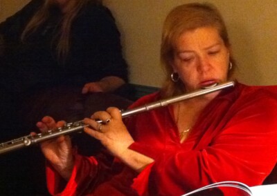 Virginia playing flute