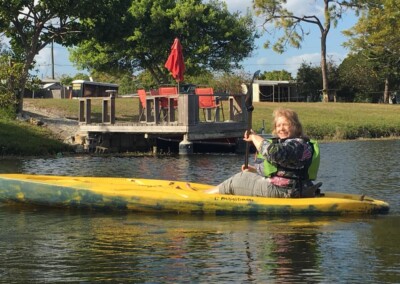 Virginia in kayak at Kate's (2020)