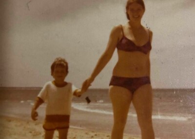 Virginia on beach with Sarah 1980