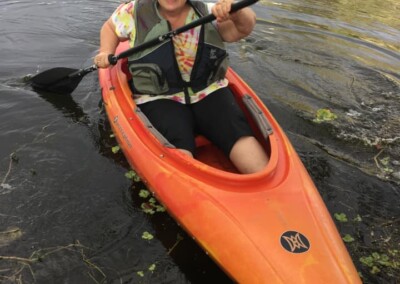 Virginia paddling her kayak (2020)